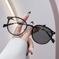 แว่นตาปรับแสงออโต้ รุ่น 2986Auto สายตาปกติ ทรงหยดน้ำใส่แล้วหน้าสวยมากๆ Photochromic blue filter เลนส์เปลี่ยนสีได้เมื่อออกแดด กรอบพลาสติก มีให้เลือก3สี ไม่รวมอุปกรณ์