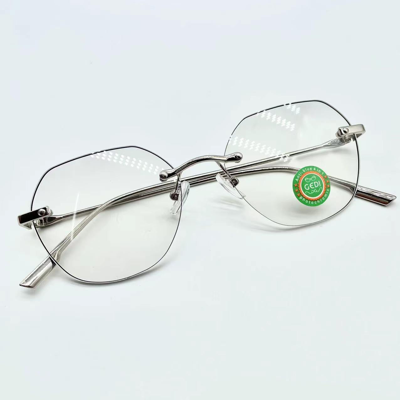 แว่นตาปรับแสงออโต้ รุ่น 6016Autoกรอบลอยไร้ขอบขาโลหะโดดเด่นสุดๆ Photochromic blue filter เลนส์เปลี่ยนสีได้เมื่อออกแดด มีให้เลือก2สี ไม่รวมอุปกรณ์