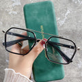 แว่นตาปรับแสงออโต้ รุ่น 0039Auto ทรงเหลี่ยมมีคานสุดเท่ใส่สวย Photochromic blue filter เลนส์เปลี่ยนสีได้เมื่อออกแดด กรอบโลหะ มีให้เลือก4สี ไม่รวมอุปกรณ์